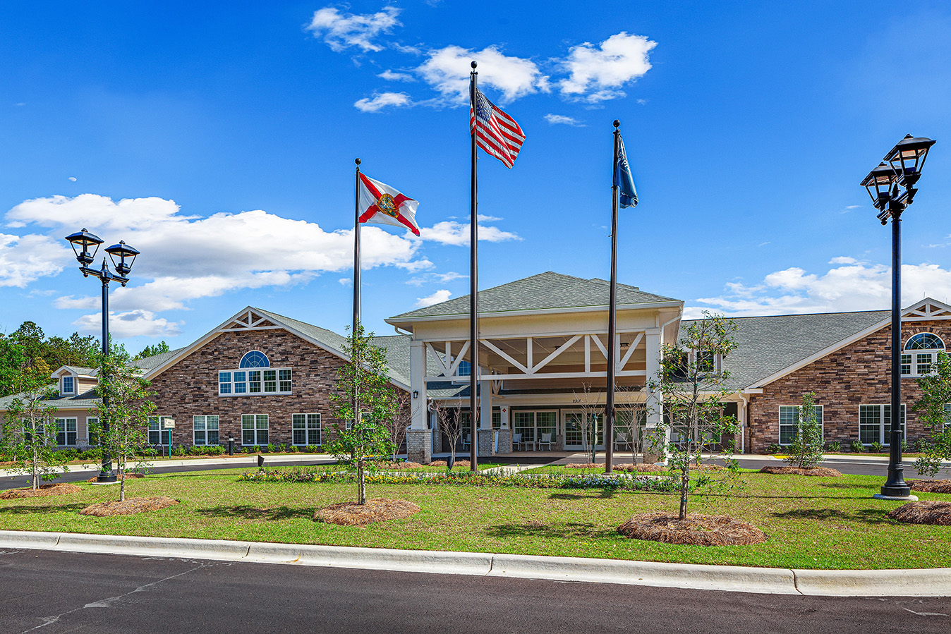 Exterior view of the assisted living facility with landscaping