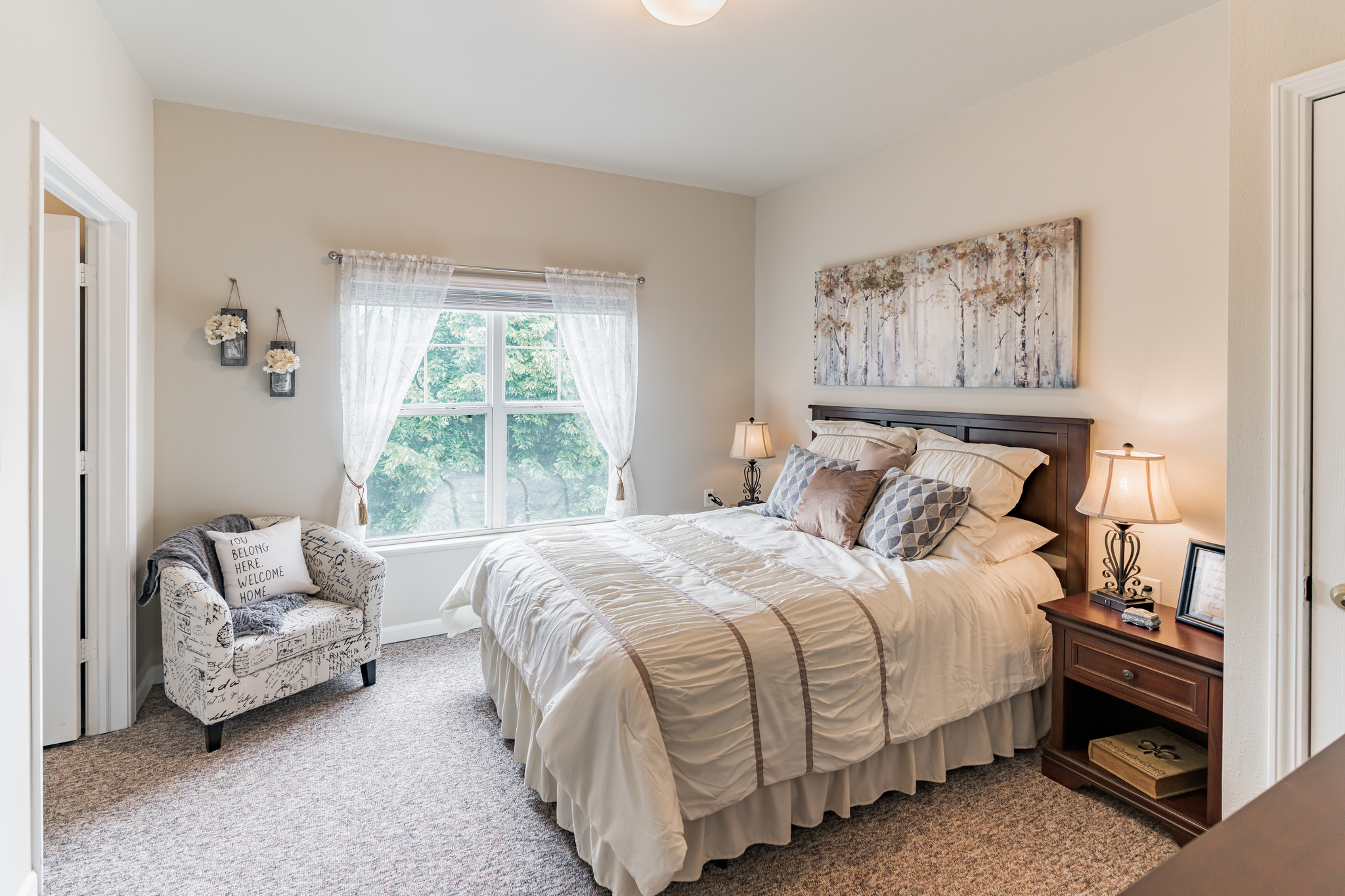 Cozy private resident room with a bed and window