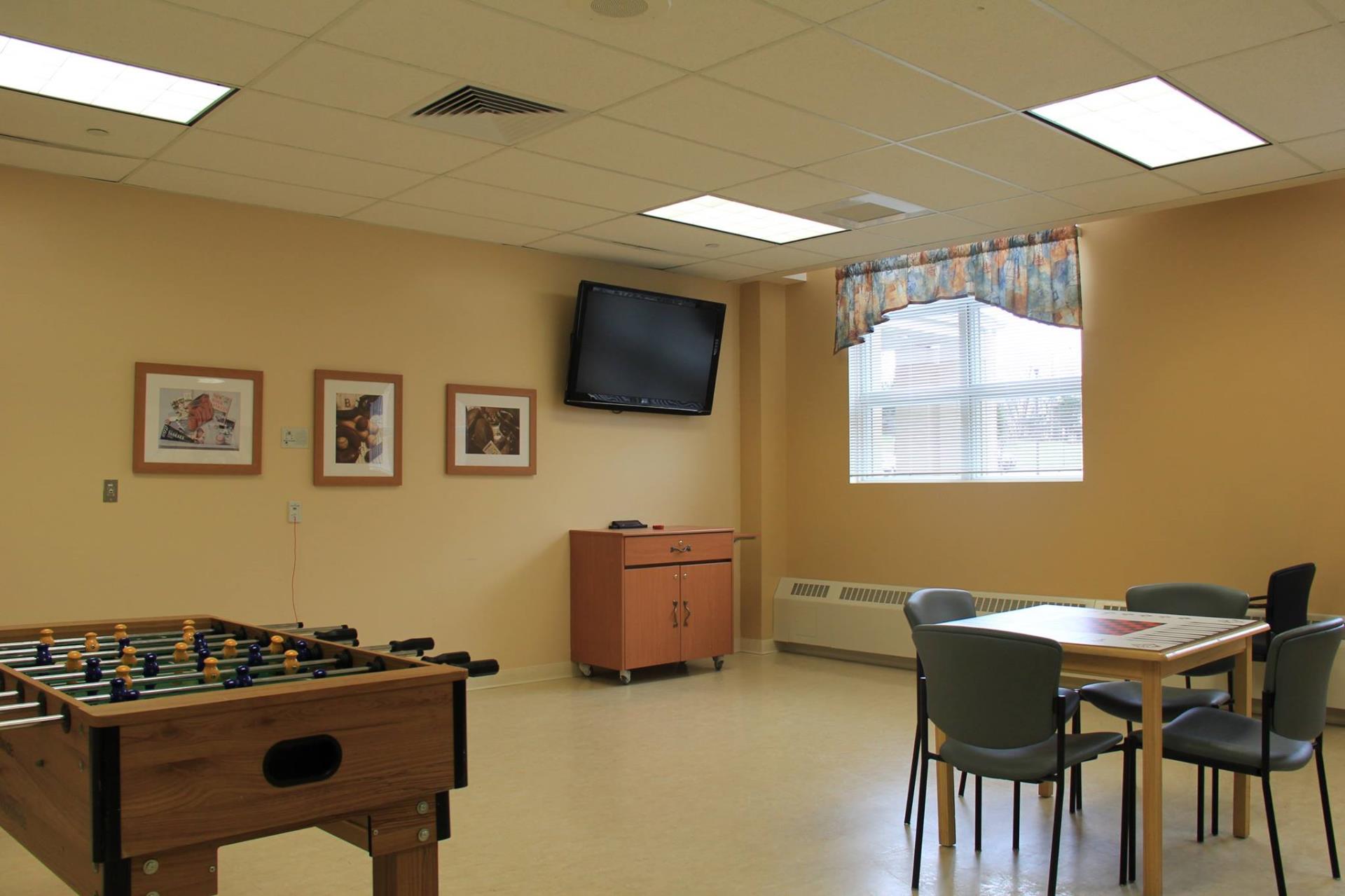 Common area with foosball table and seating