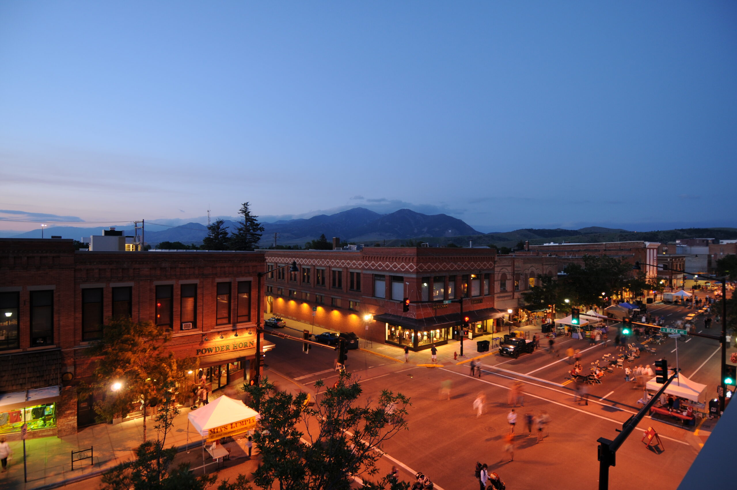 City street view at twilight with mountains