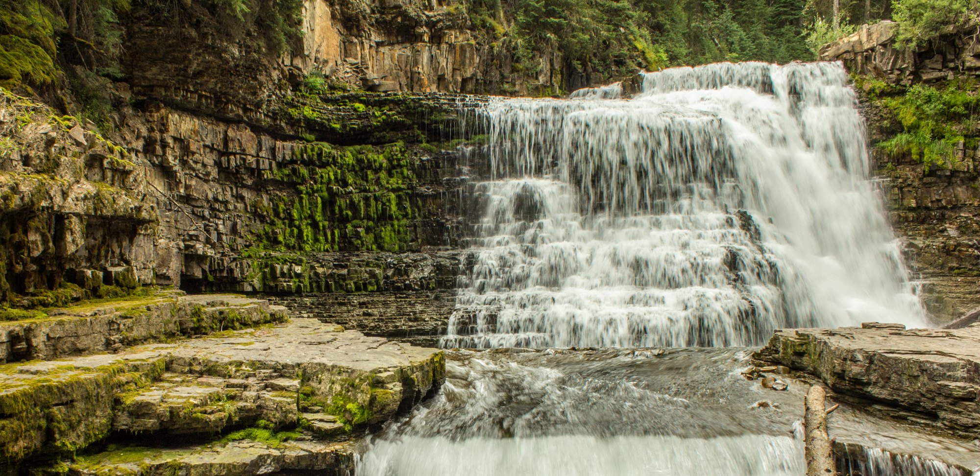 A serene waterfall in a natural landscape
