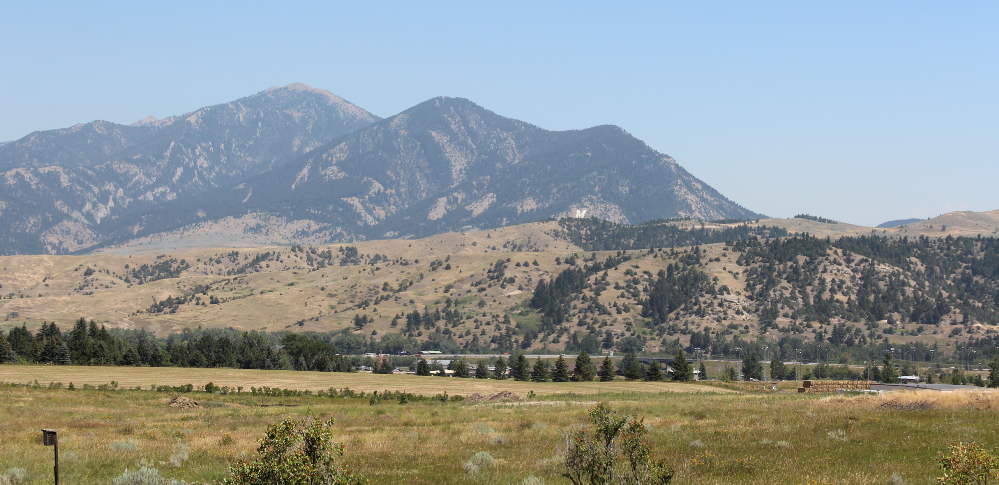 Scenic view of mountains and open fields