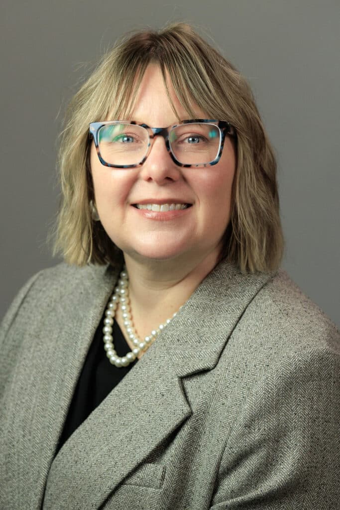Professional portrait of a woman in a blazer