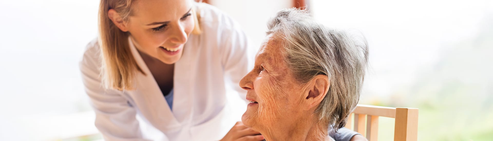 Staff member interacting with a senior resident