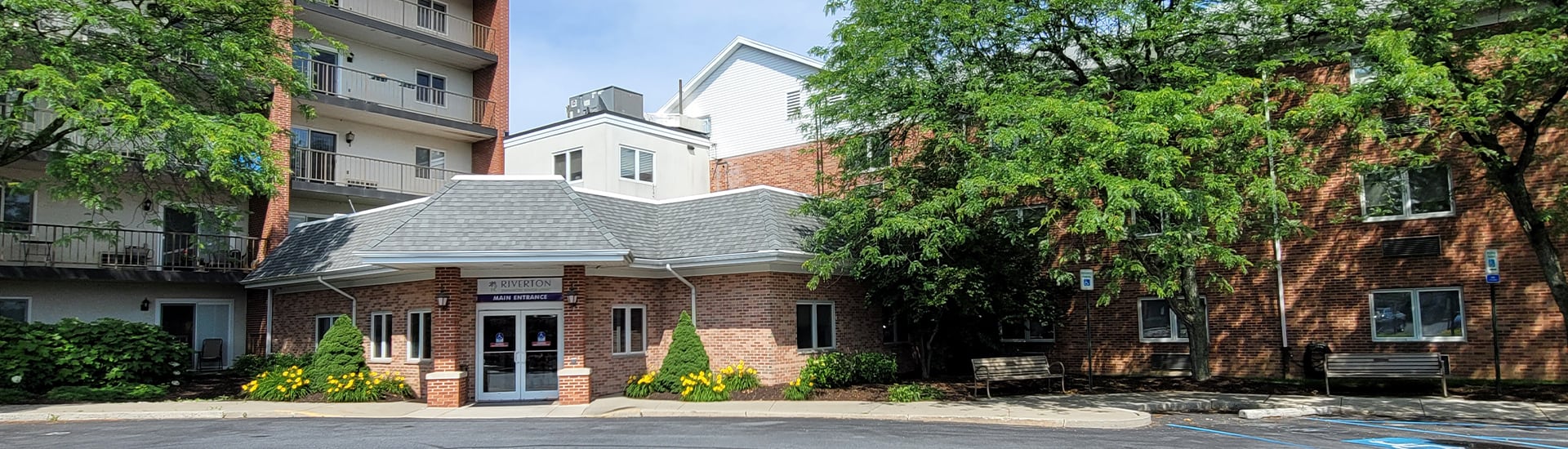 Exterior view of Riverton Enhanced Senior Living entrance