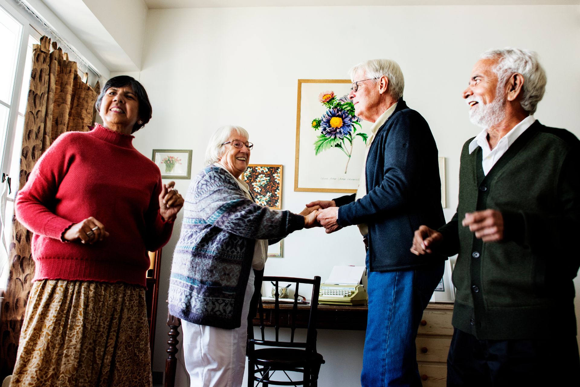 Residents enjoying a social dance in the common area