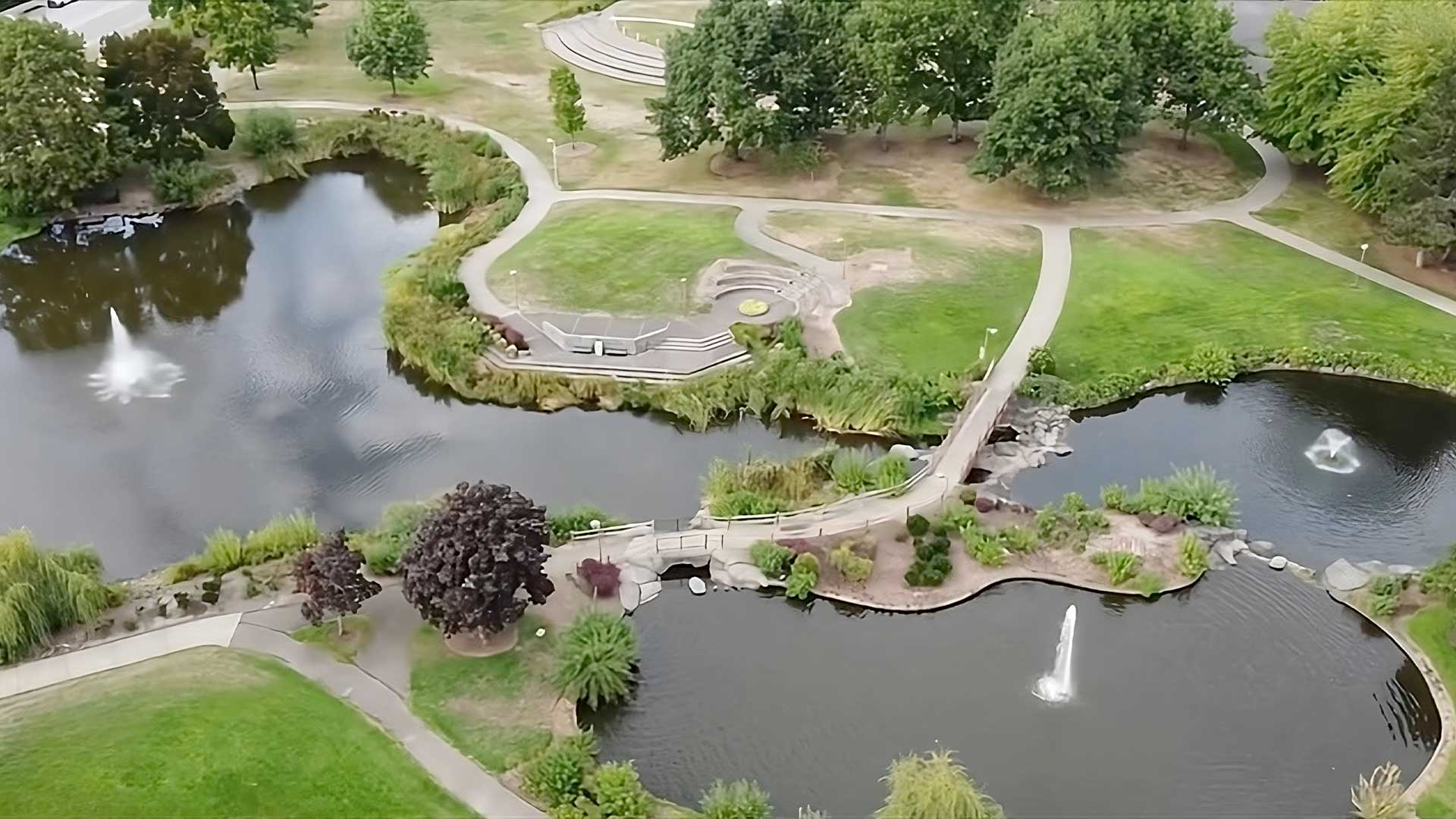 Aerial view of a beautiful outdoor space with ponds