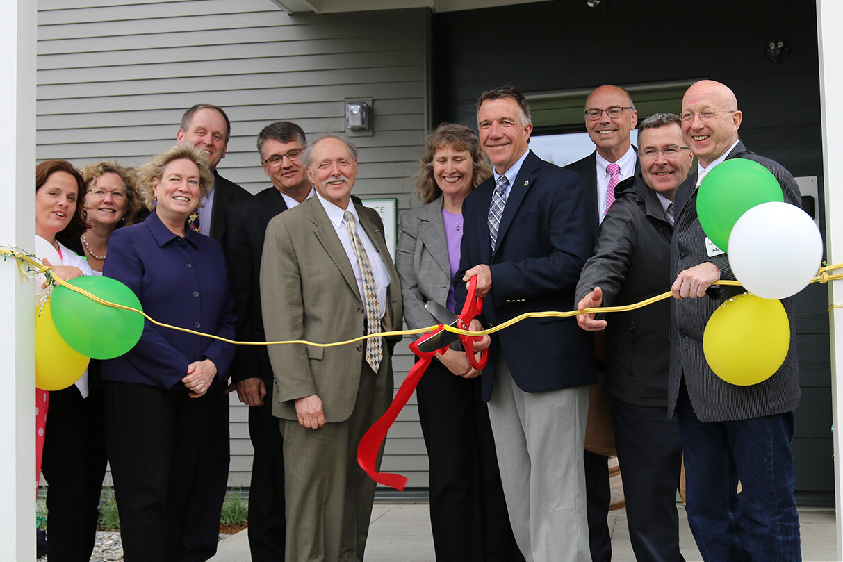 Facility opening ceremony with staff and community members