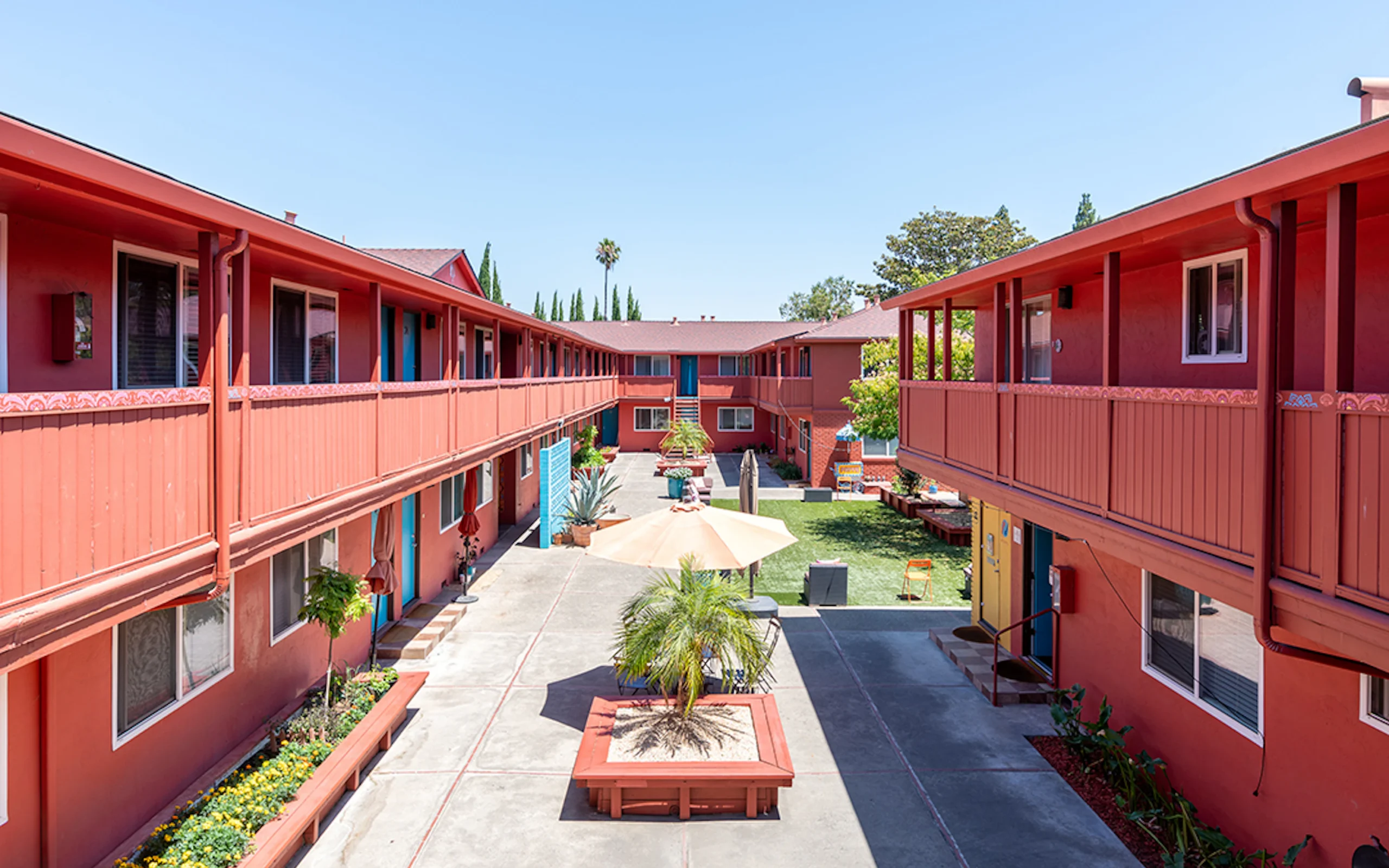 Outdoor courtyard with seating and gardens