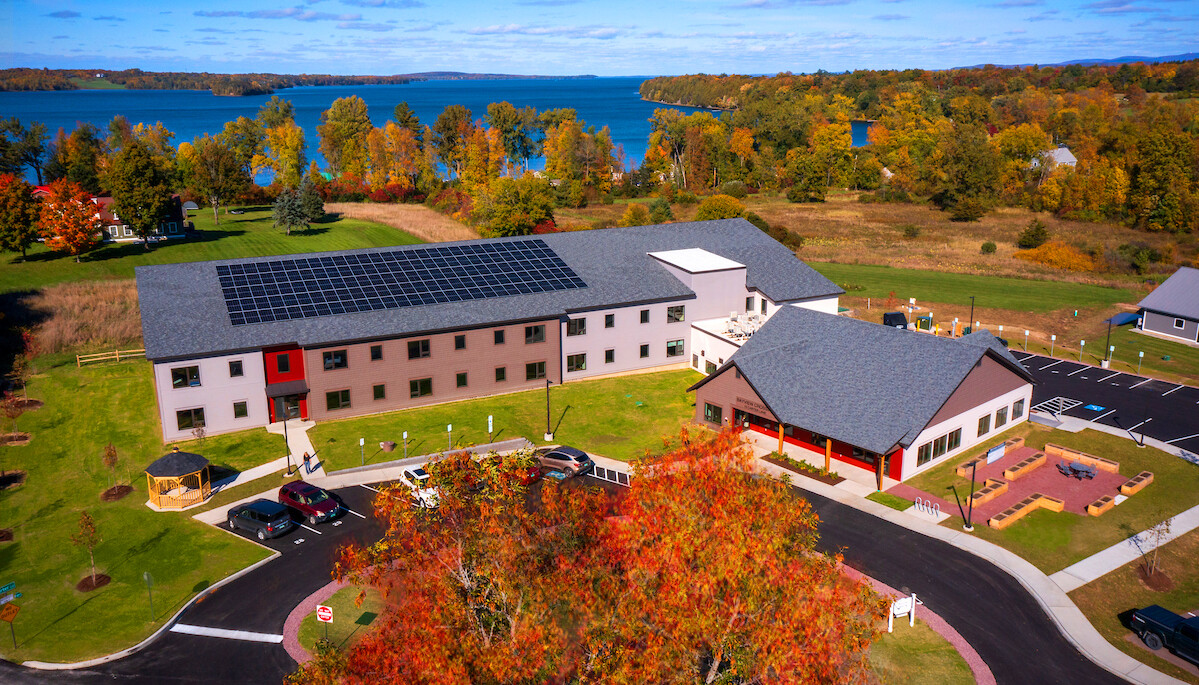 Aerial view of the senior living facility with autumn foliage
