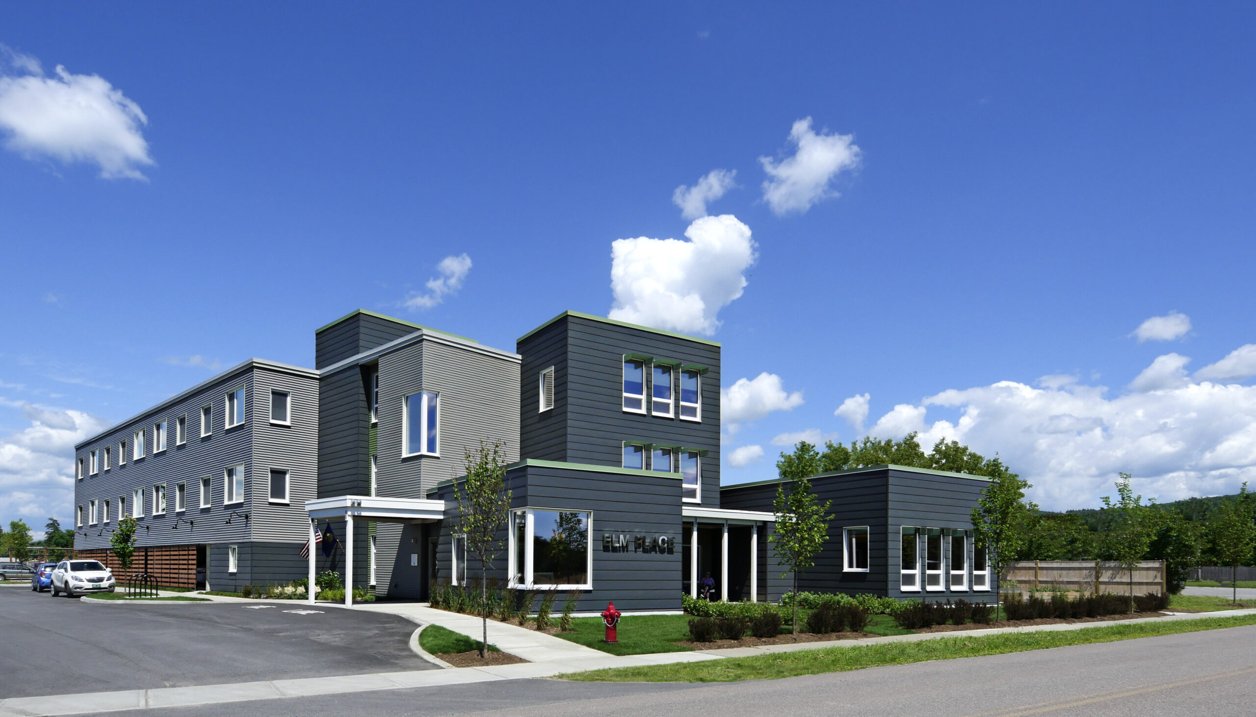 Exterior view of Cathedral Square facility with blue sky