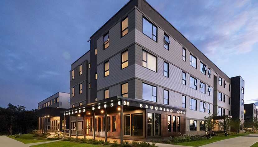 Exterior view of the Cathedral Square facility at dusk