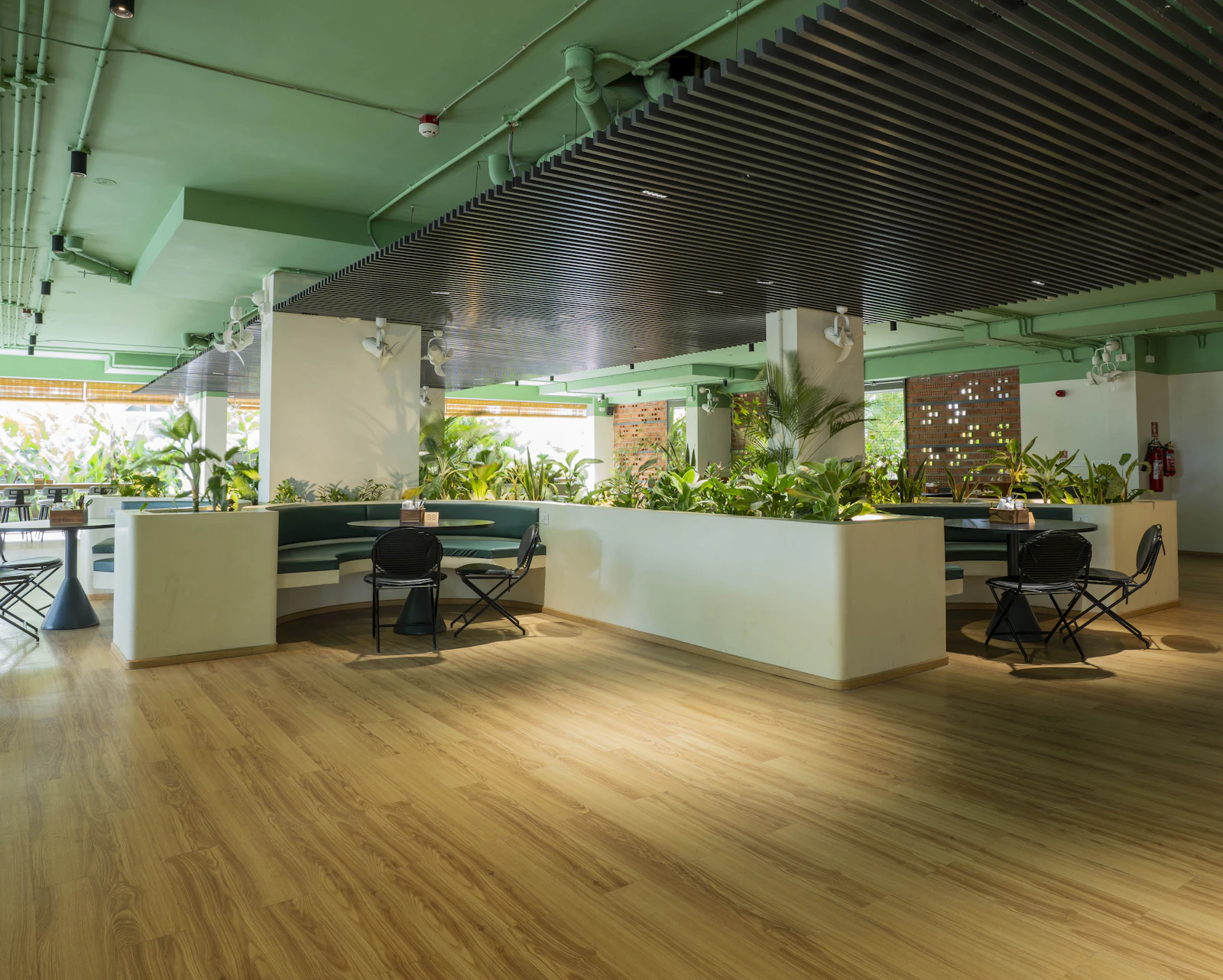 Bright interior space with greenery and seating