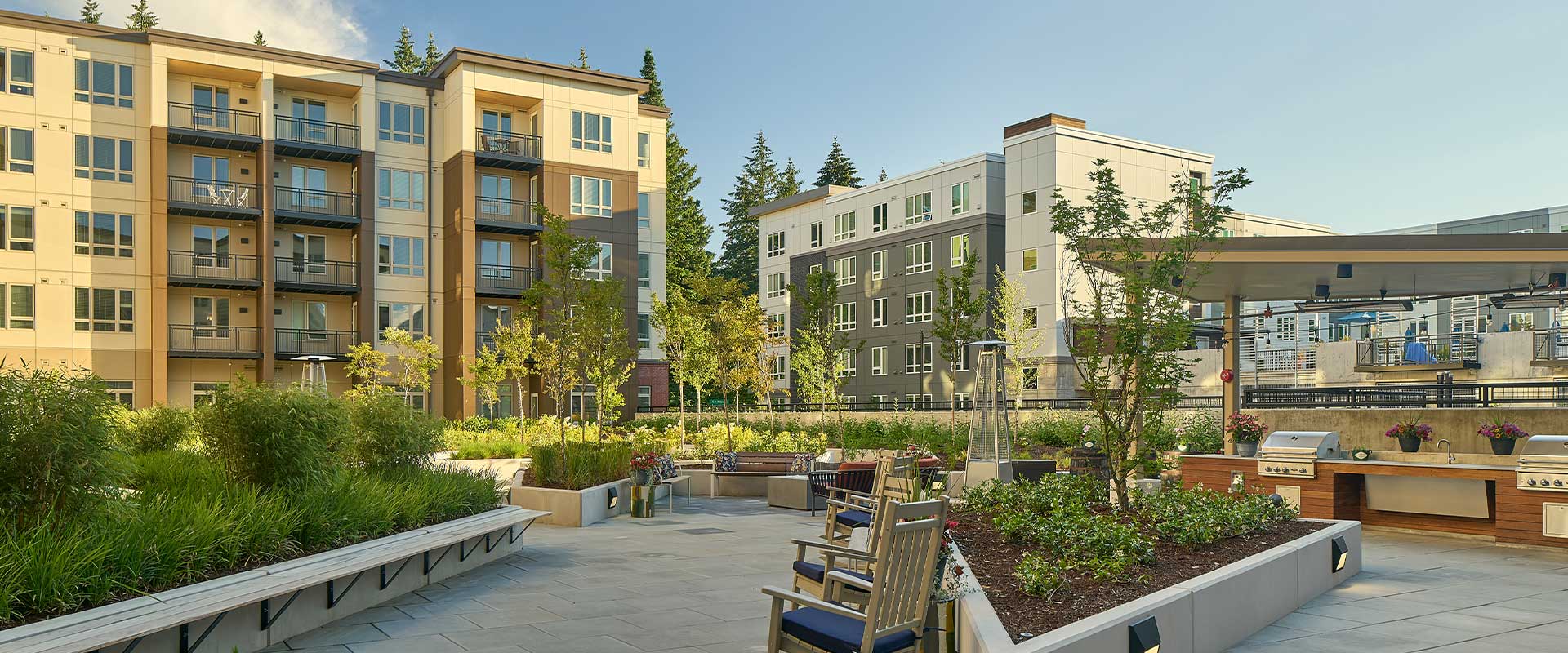 Outdoor seating area among modern buildings