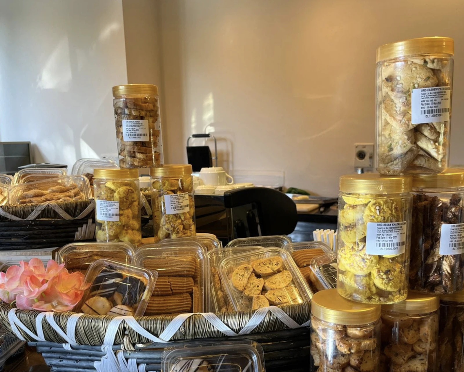 Assorted snacks in clear jars on a table