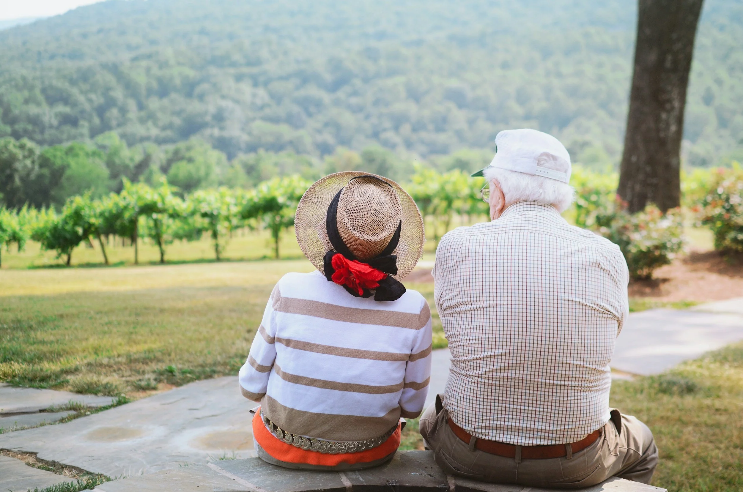 Two seniors enjoying a beautiful outdoor view