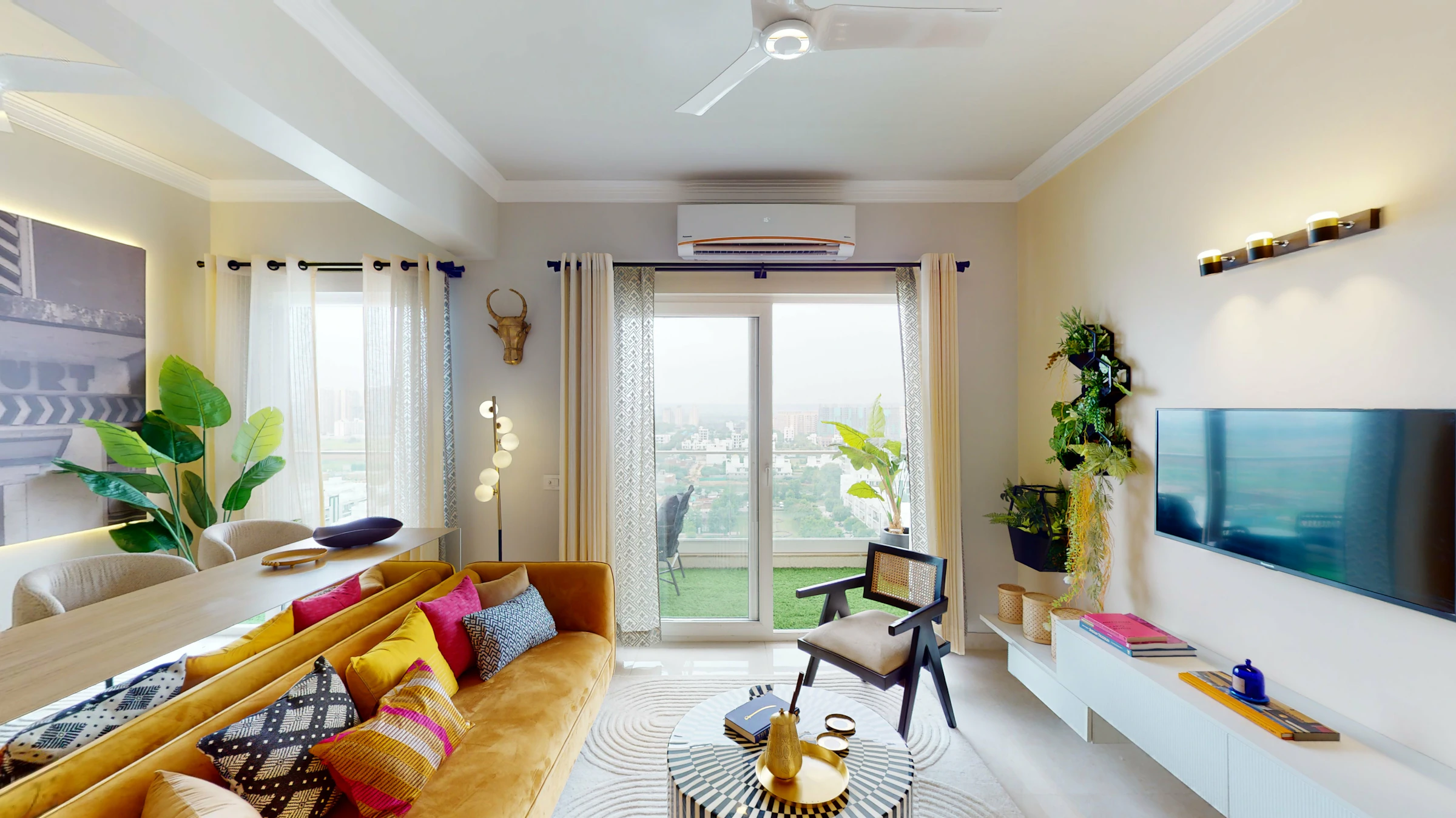 Bright common area with seating and plants