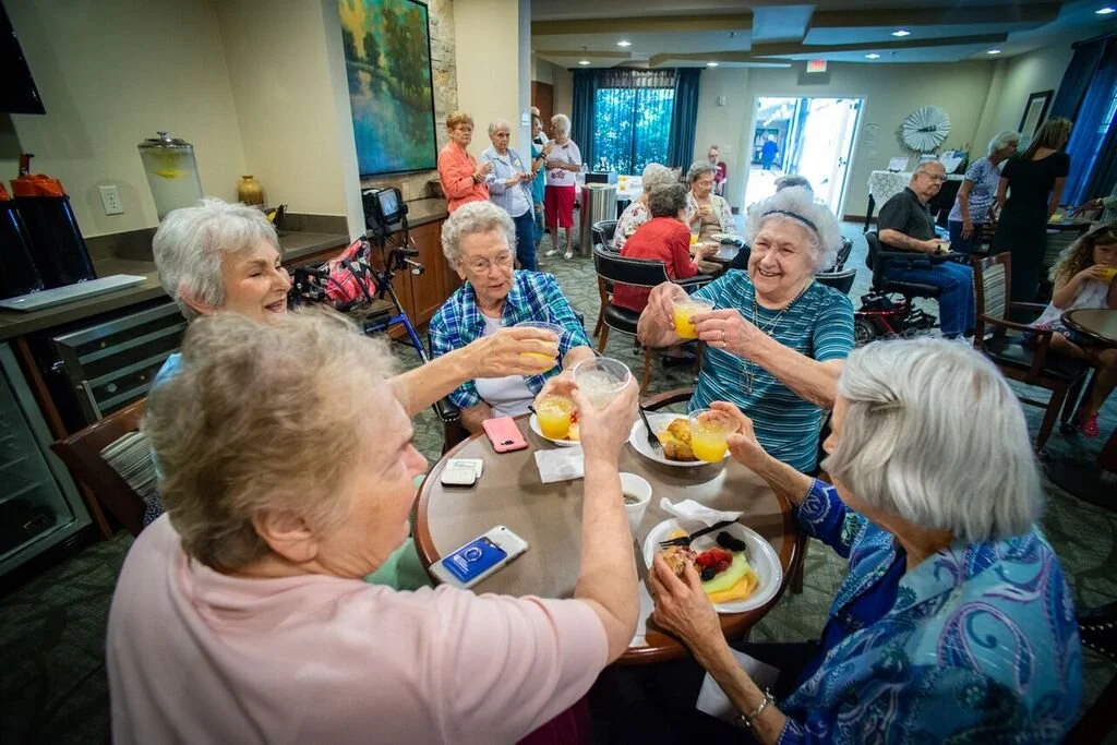 Residents enjoying a social gathering with refreshments