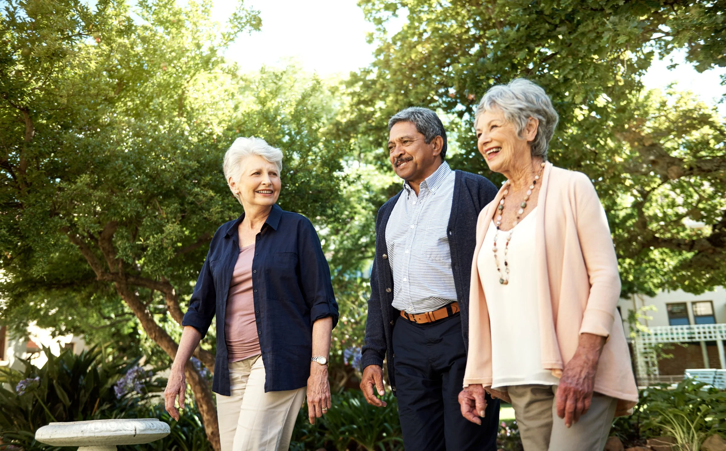 Residents enjoying a walk in the garden