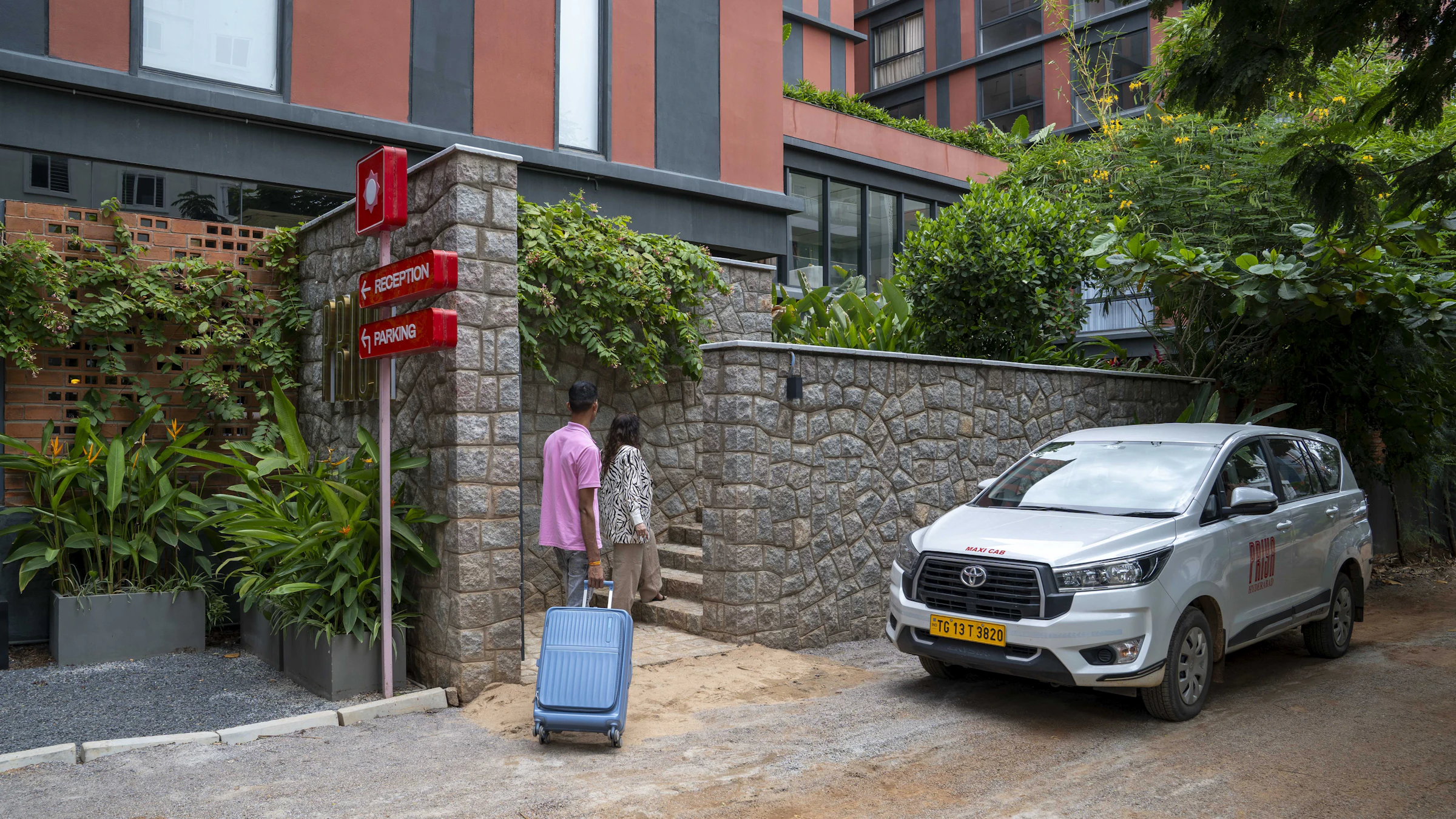 A resident arriving at the facility with luggage