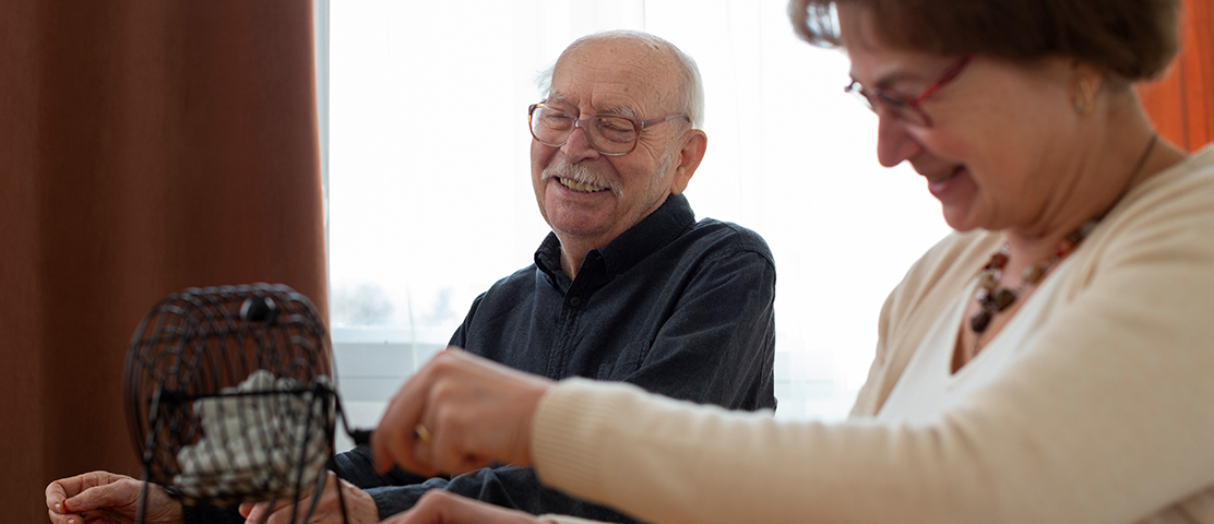 Residents playing bingo in an activity setting