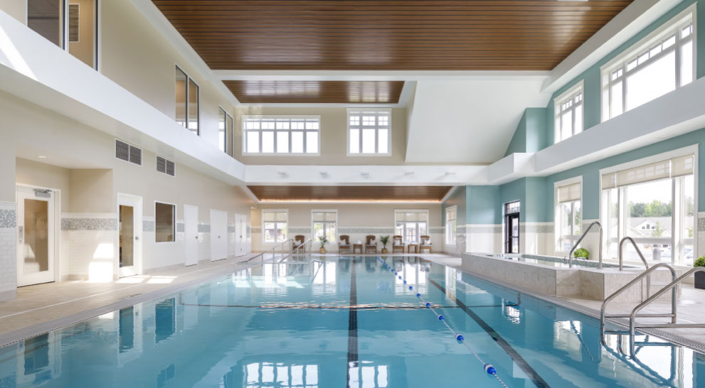 Indoor swimming pool area with natural lighting