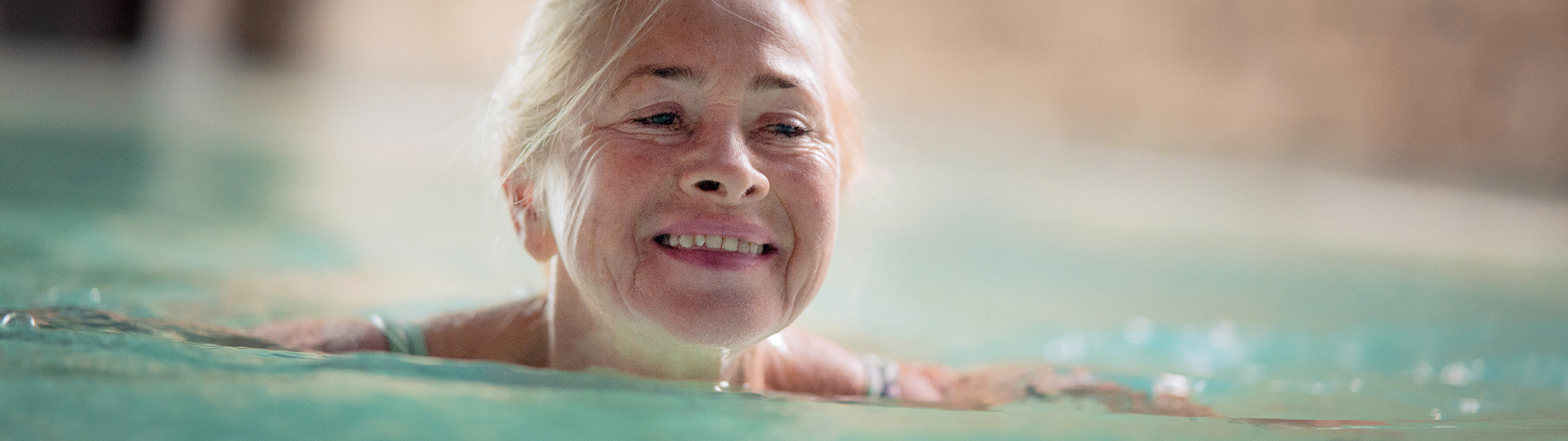 Woman swimming in a therapy pool