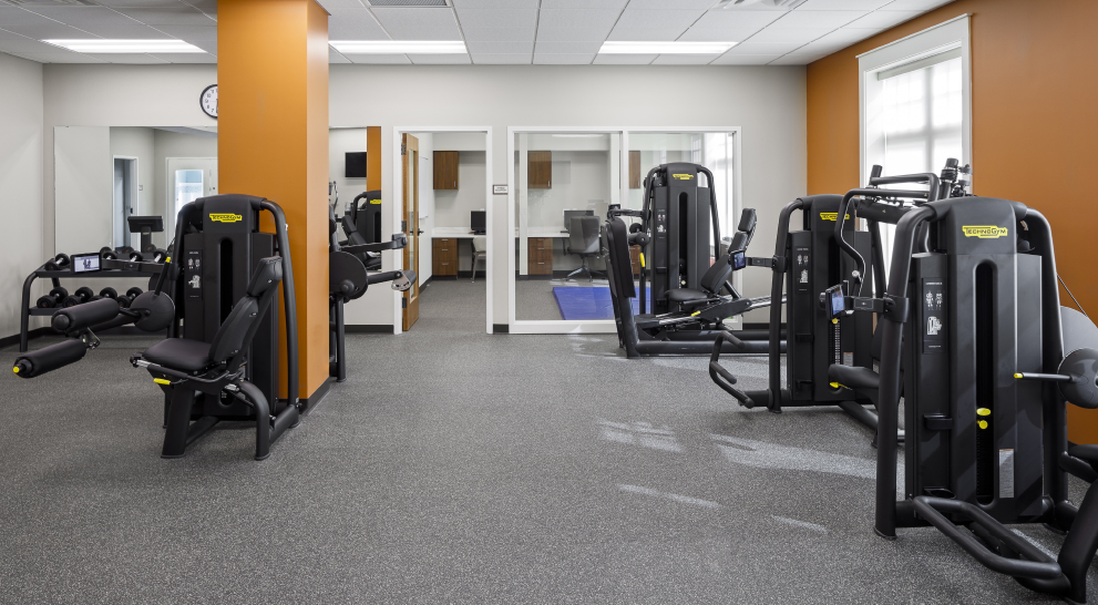 Interior view of a fitness area with exercise equipment