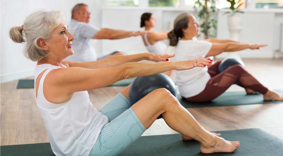 Residents participating in a yoga class