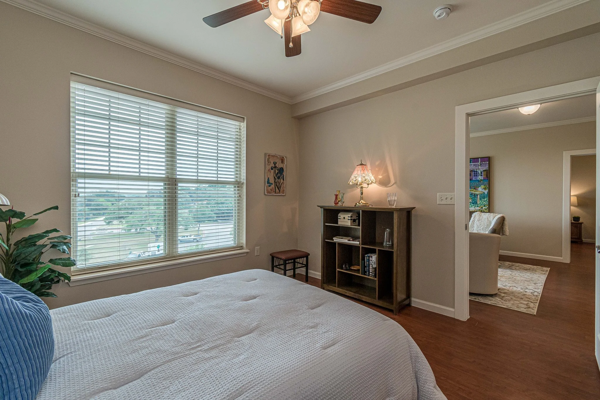 Cozy resident bedroom with natural light