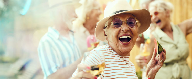 Residents enjoying a celebration with drinks and laughter