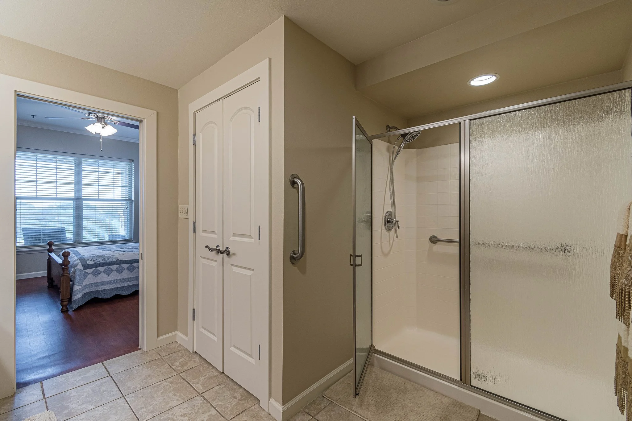 Interior view of a resident bathroom and bedroom