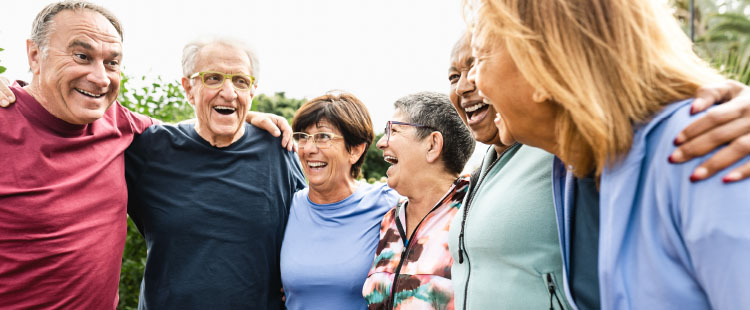 Residents and staff enjoying a joyful moment outdoors