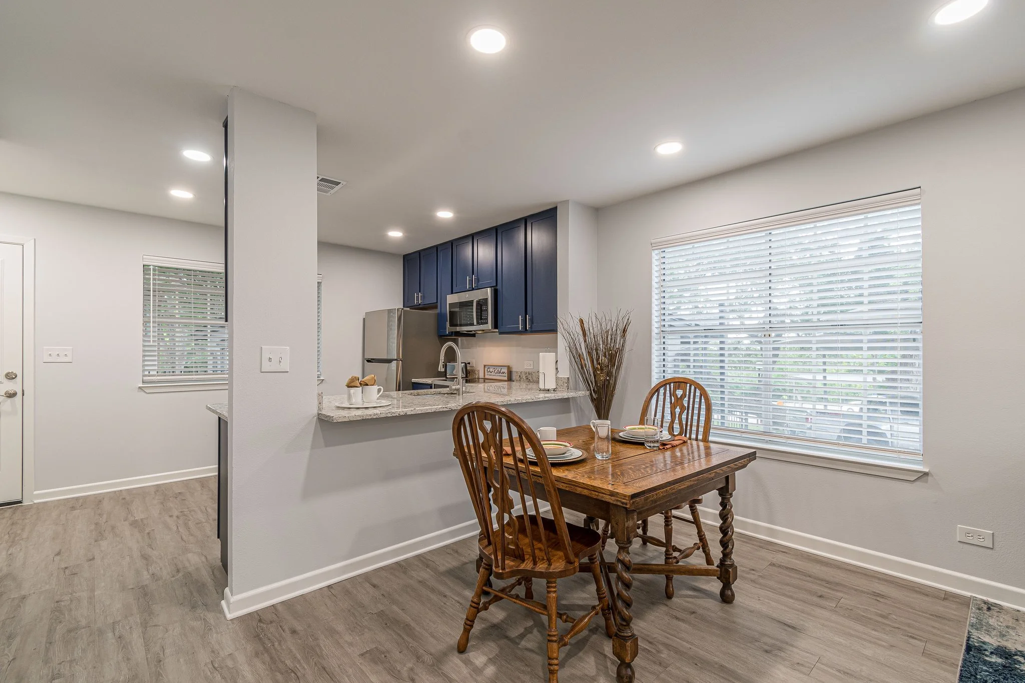 Modern dining area with wooden table and chairs
