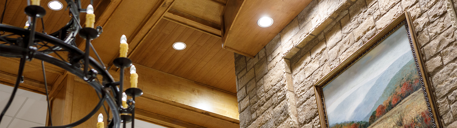 Interior space featuring wood beams and artwork