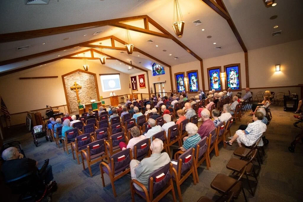 Residents attending a community event in a common area