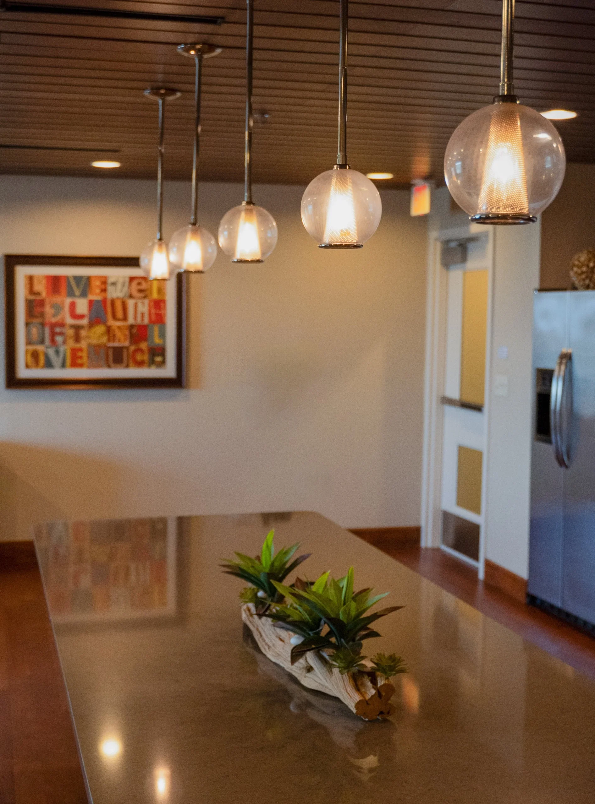 Interior view of a common area with pendant lights
