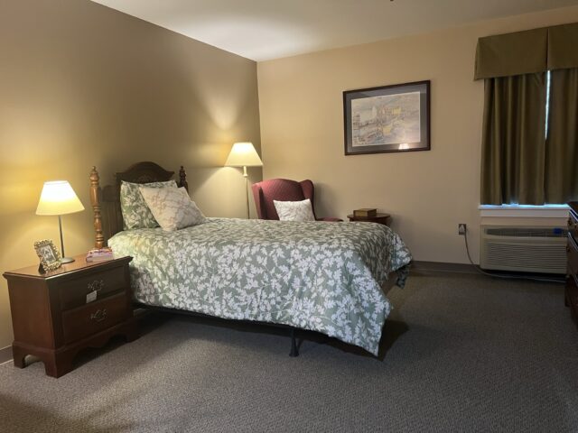 Cozy private bedroom with a bed and furniture