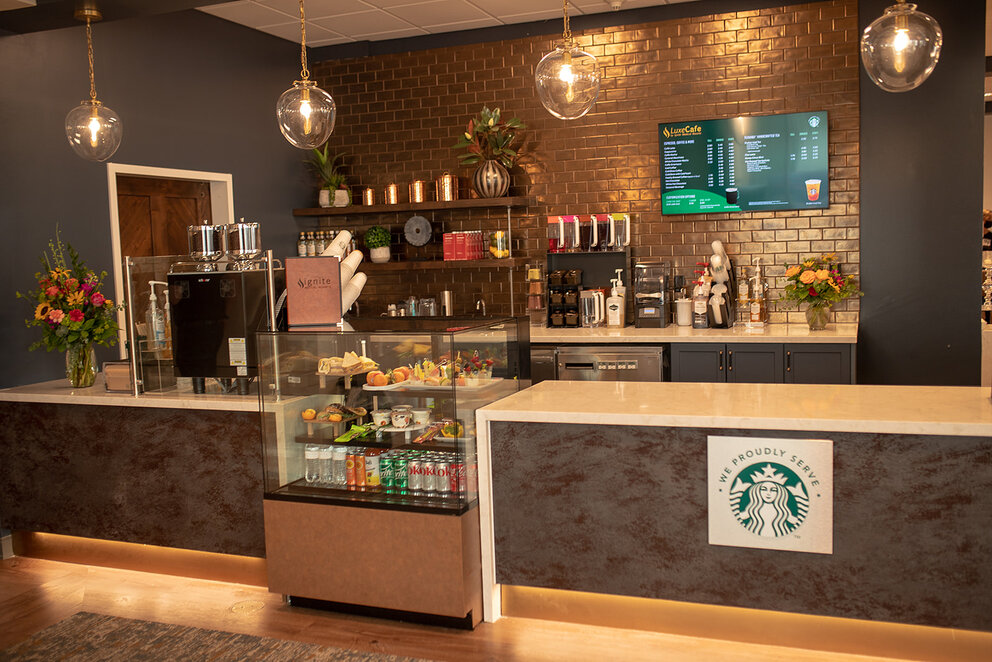 Coffee shop with a menu and food display