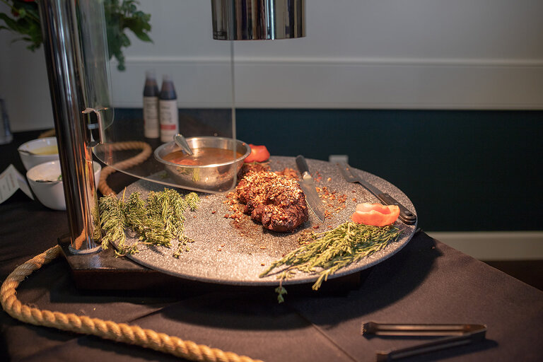 A beautifully presented meal with herbs and seasonings.