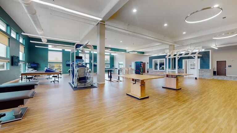 Spacious therapy room with equipment