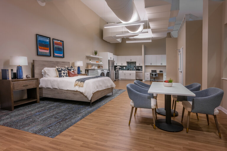 Cozy private living unit with kitchen and dining area.