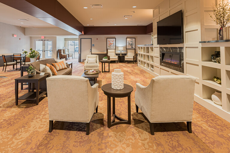 Cozy common area with seating and fireplace