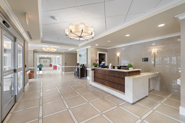 Bright interior lobby with reception area.