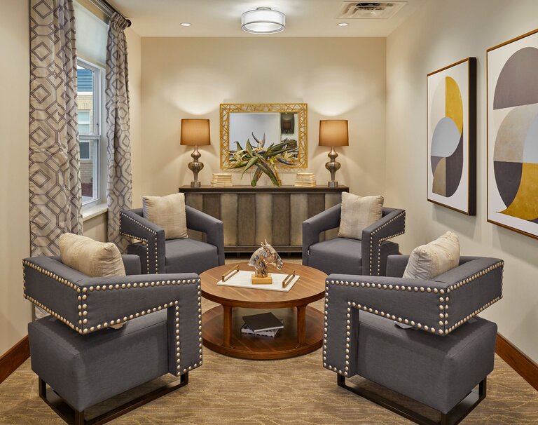 Interior seating area with stylish chairs and decor.