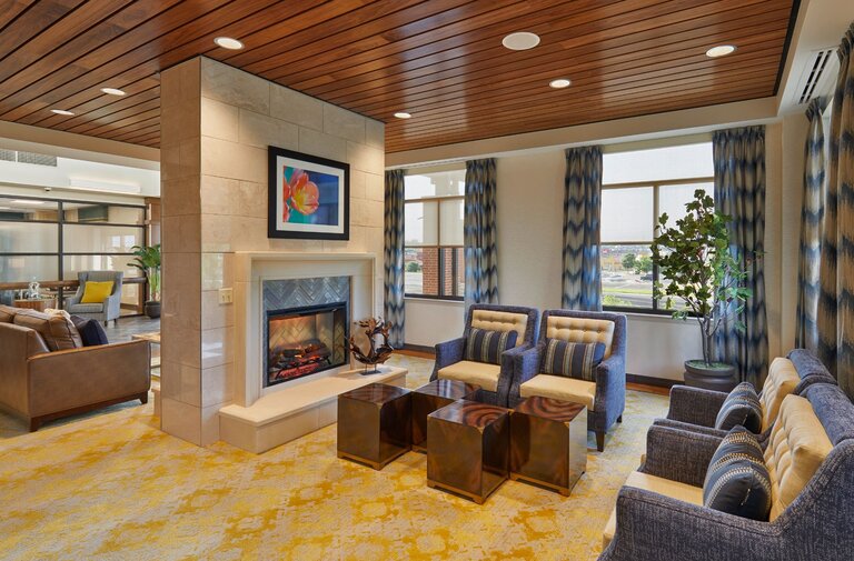 Comfortable common area with seating and fireplace