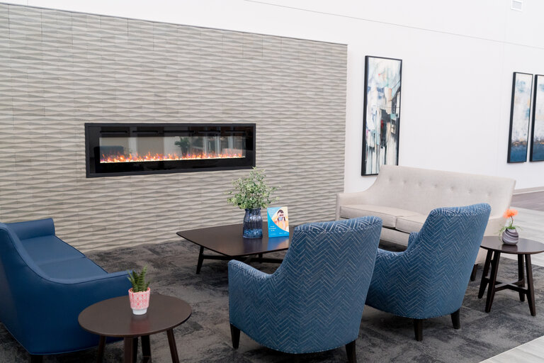 Interior lounge area with seating and fireplace