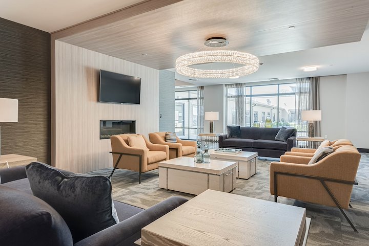 Modern common area with seating and lighting