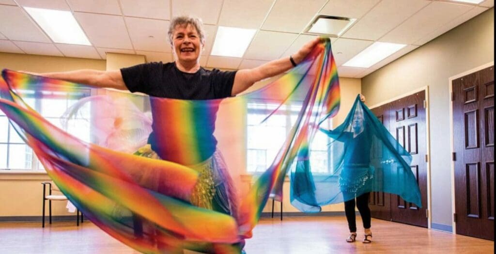 Dance class with colorful ribbons in an activity room