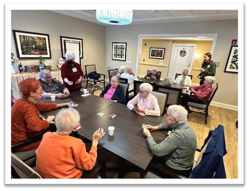 Residents engaging in a card game
